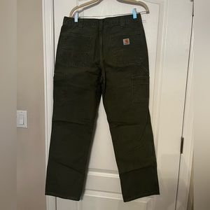 Men’s Carhartt pants, size 33x32. NWOT. Olive green color.